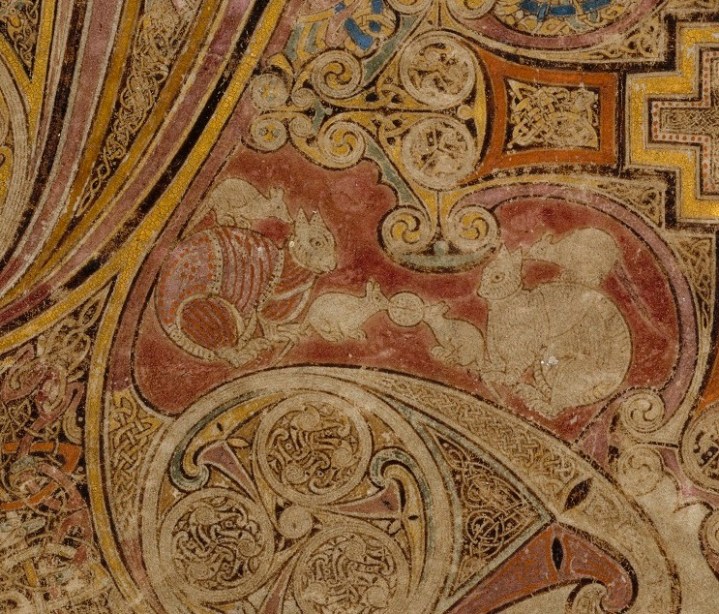 Two cats feature in an illustration from the Book of Kells