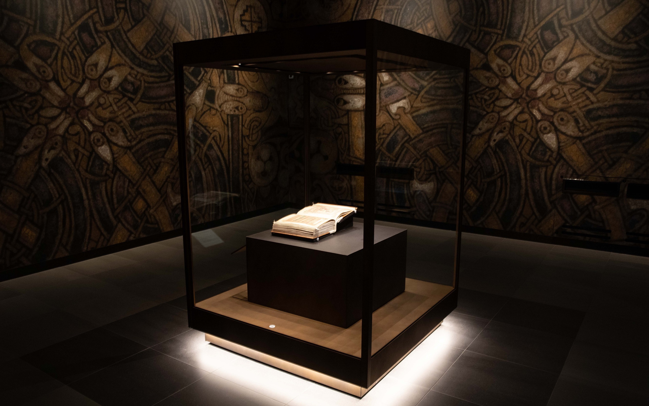 The Book of Kells on display in The Book of Kells Experience at Trinity College Dublin.